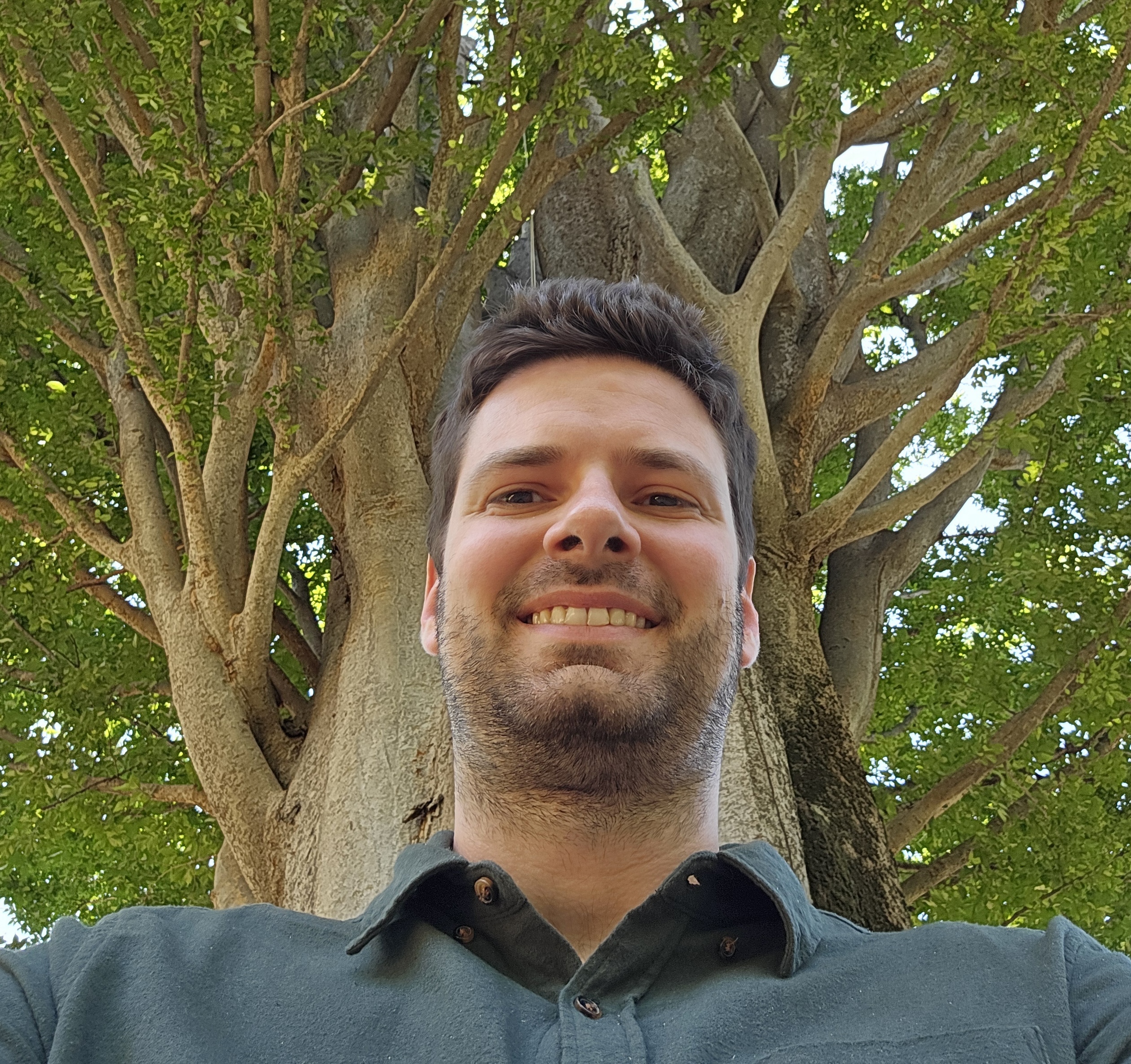 Manolo Fernandez Perez, black and white portrait under trees